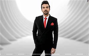 An Indian actor, Manit Joura looks gentleman in a black suit